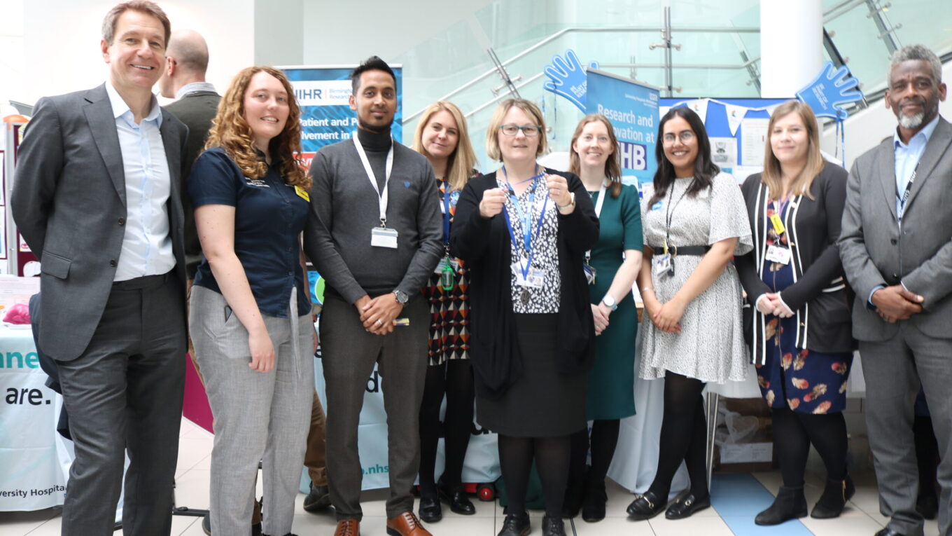 BRC team in front of stand