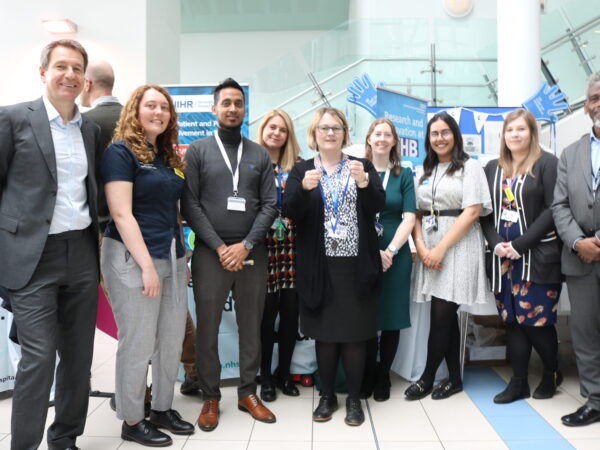 BRC team in front of stand