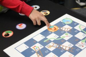 IMG_1790 Pupil playing the BRC Snakes and Ladders at SciMED