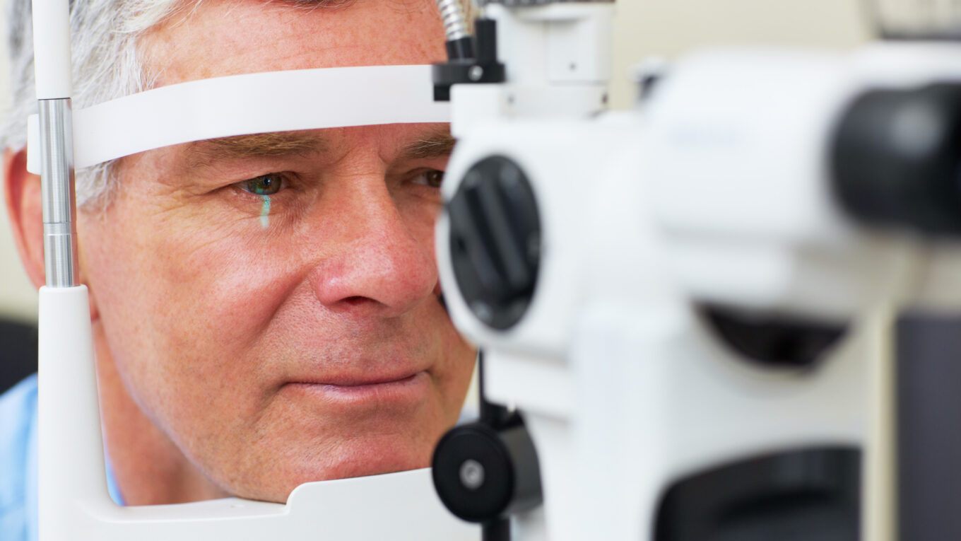 Middle aged man undergoing an eye test