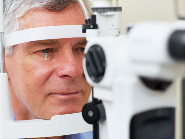 Middle aged man undergoing an eye test
