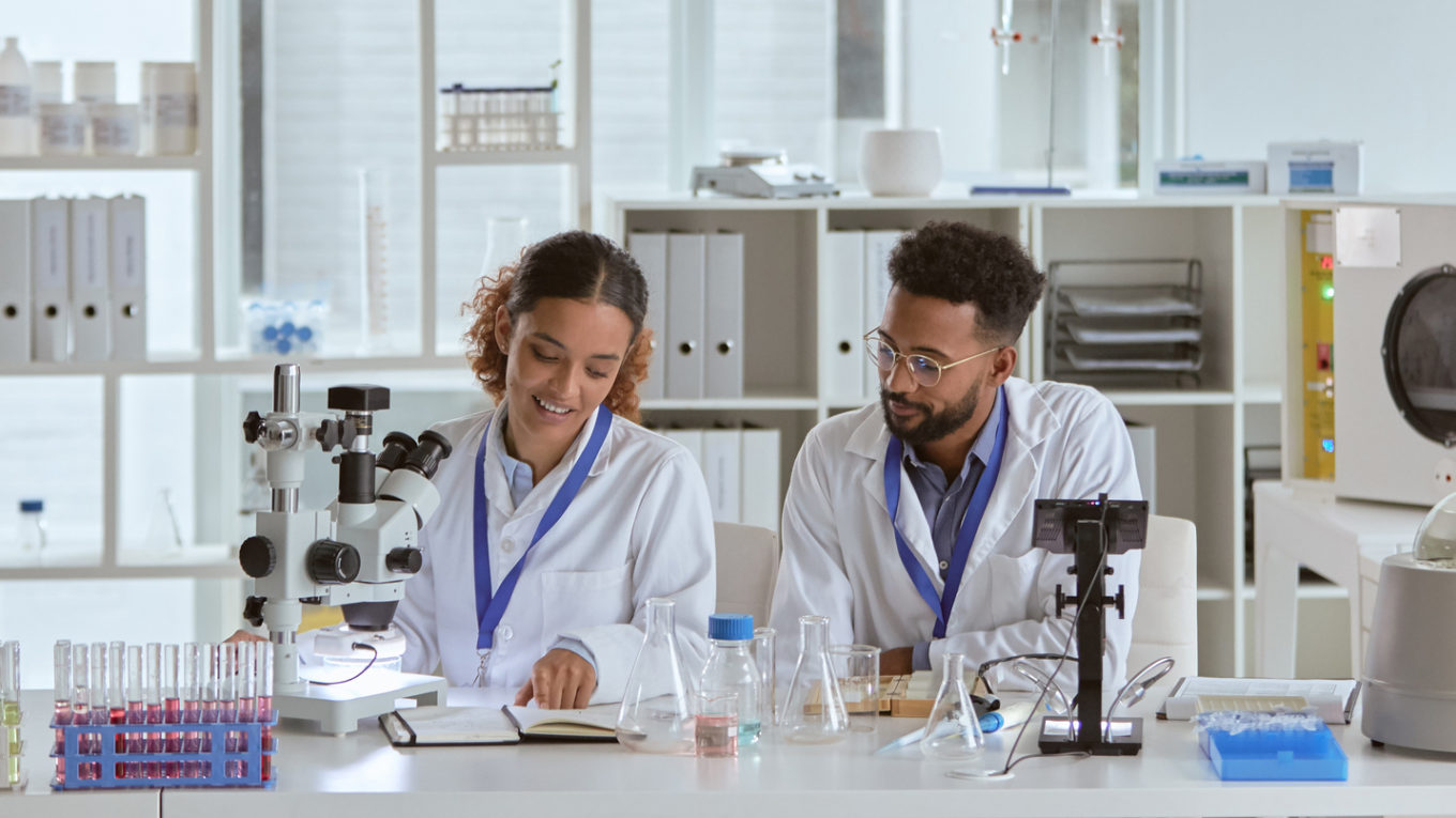 Two scientists working together in a lab
