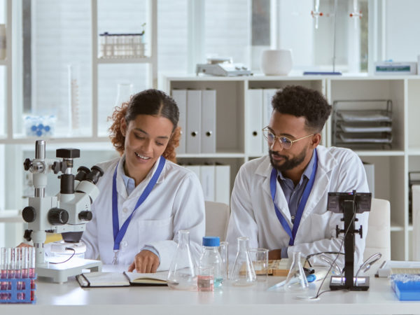Two scientists working together in a lab